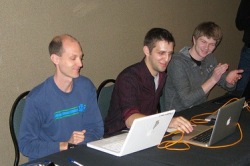 Winner Charlie Miller (left), Judge Aaron Portnoy from TippingPoint (middle) and winner Nils (right)